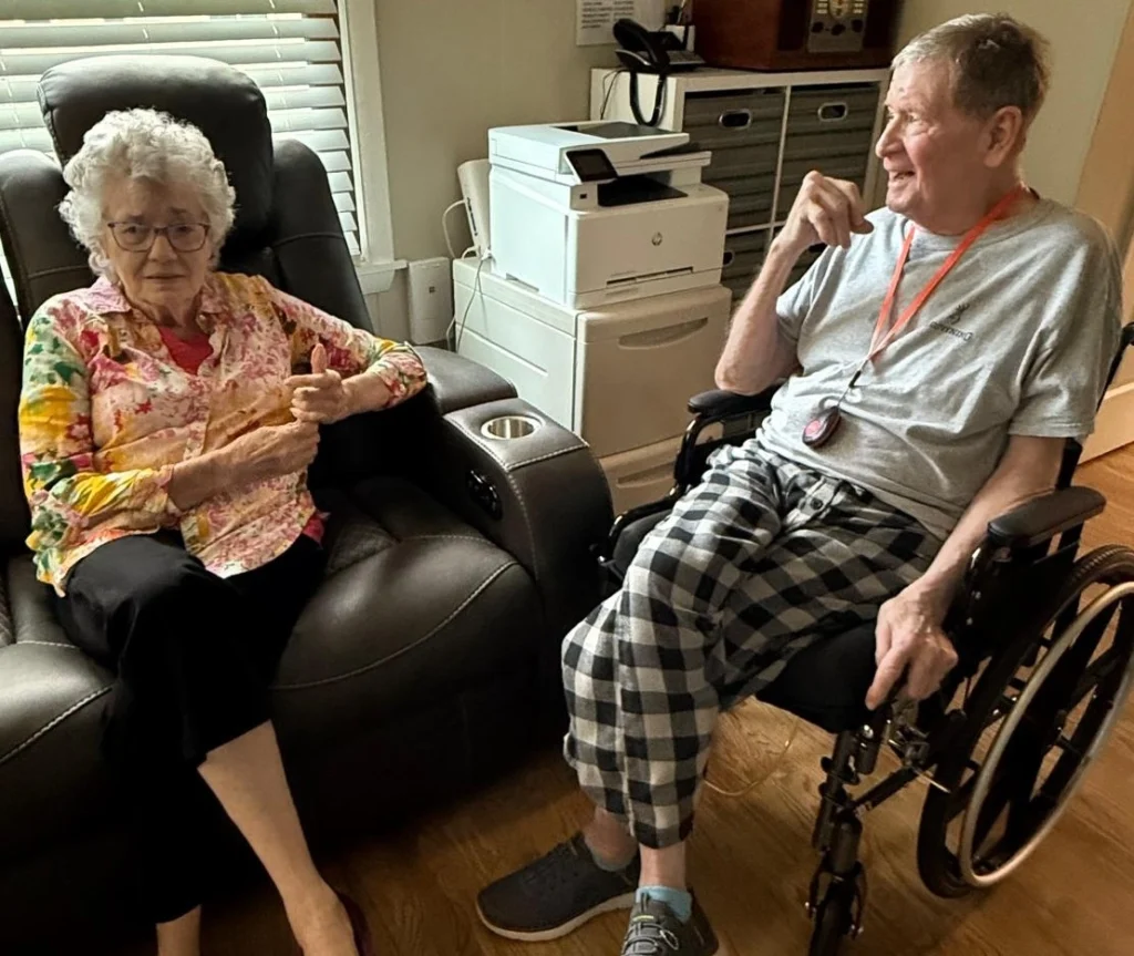 Two Senior Residents Enjoying Time Together In A Comfortable Living Area 1024x863